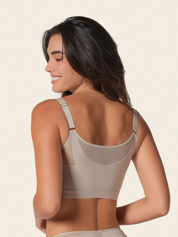 Soutien facilitador de postura com copas de espuma e suporte ergonómico.